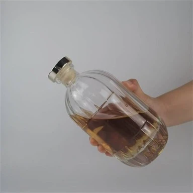 Dikke bodem ovale glazen drankfles met T-dop